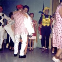 05/64 - District 4C-4 Convention, Hoberg’s Resort, Lake County - Having a good time is, L to R, member, wife, Charlie Bottarini hugging Eva Bello, Irene Tonelli, member (from another club), and Emma Giuffre (partial).