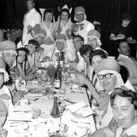 May 1965 - District 4C-4 Convention, Hoberg‘s Resort, Lake County - Enjoying dinner are: L to R: left side: Bill Tonelli, member, wife, Anne & Gino Benetti; end: Frank Ferrera; right side from lower corner: wife, Pete & Eva Bello, Maryann & Art Blum, and guest; standing: Pat Ferrera, Estelle & Charlie Bottarini.