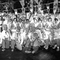 May 1965 - District 4C-4 Convention, Hoberg‘s Resort, Lake County - The whole crew; L to R: back row: guest with camera, Pete & Eva Bello, wife, Anne Benetti, wife, Esther Shortz, Irene Tonelli, Pat Ferrera, Maryann Blum, and Estelle Bottarini; kneeling: Gino Benetti, Charlie Bottarini, member, member, Bill Tonelli, Frank Ferrera, and Art Blum; with horn: member.