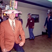 May 1971 Convention - Lions on parade wearing hat depicting various Lions services and events - Charlie Bottarini in foreground.