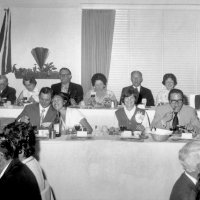 July 1970 to June 71 - Charlie Bottarini’s year as Deputy District Governor - Estelle & Charlie Bottarini, lower dais on left, enjoying a District function.