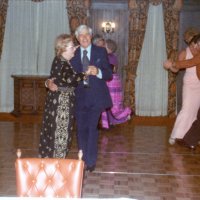 6/21/75 - Installation of Officers, Presidio Golf Club, San Francisco - Center in black print dress: Elva Buoncristiani with guest; in back: unknown; right: Tom O’Connell and member’s wife.