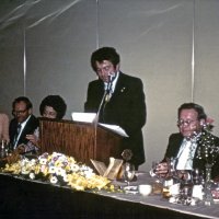 6/17/78 - Installation of Officers, Ramada Inn, S.F. Airport, Millbrae - L to R: Trudy & Leonardo Bacci, Emily & Joe Farrah, and Ervin & Elena Smith. New installed President Joe Farrah talking about his plans for the coming Lions year.