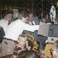 10/18/78 - Father & Son Night, L & L Castle Lanes, San Francisco - Two sons help Ed Damonte, behind projector; Chris Pacheco in front of them; Fred Melchiori, blurred in lower right.