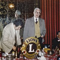 2/14/79 - Past District Governors Night & New Member Induction, L & L Castle Lanes, San Francisco - L to R, seated and standing: Handford Clews, Joe Farrah, PDG Maurice Perstein, and PDG Chan Wah Lee. PDG Maury Perstein, from the Marina Lions, talking about his year as District Governor in 1952-53.