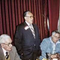 2/14/79 - Past District Governors Night & New Member Induction, L & L Castle Lanes, San Francisco - L to R, seated and standing: PDG Maurice Perstein, PDG Chan Wah Lee, and PDG Joe Giuffre. PDG Chan Wah Lee, from the Chinatown Lions, talking about his year as District Governor in 1967-68.
