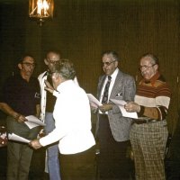 12/20/78 - Club Cristmas Party, L & L Castle Lanes, San Francisco - L to R: Charlie Bottarini, Giulio Francesconi, Sam San Filippo, Pete Bello, and Handford Clews, with Bill Tonelli leading, all singing Quel Bel Massolini Di Fiori.