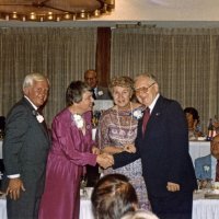 7/31/82 - Cabinet Installation, Amfac Hotel, Burlingame - most are unidentified; Foreground: John & Martha Benson with Sophie & Ted Zagorewicz. Background at podium Don Stanaway; Leonardo Bacci, left of John at subhead; Marsha Kliewer, left of Ted’s shoulder at head table.