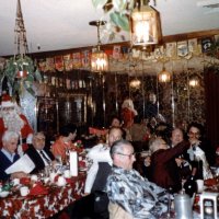 12/15/82 - Club Christmas Party at a regular meeting, L & L Castle Lanes, San Francisco - Left table, left side: Guest, Al Gentile, Santa, Fred Schroeder, Lyle Workman, and Handford Clews, at head table; left table, center: Dick Johnson; right table: Frank Ferrera, with three guests