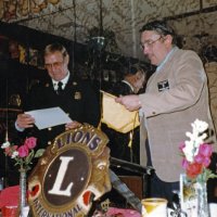 5/11/83 - Guest Speaker Program, L & L Castle Lanes, San Francisco - Handford Clews, right, presenting our guest speaker with a cerrificate of appreciation and club banner for his efforts. Frank Zumwalt on left.