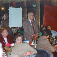 1/19/83 - New Member Induction & Ladies’ Night, L & L Castle Lanes, San Francisco - Les Doran & Drake Woznick - L to R Head table: Carol & PDG Don Stanaway, unknown, John Madden, and Ann Pacheco. Foreground: Emily Farrah.