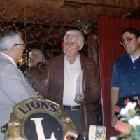 1/19/83 - New Member Induction, L & L Castle Lanes, San Francisco - Howard Pearson - L to R: PDG Joe Giuffre congratulating newly inducted Lion Howard Pearson while sponsor Handford Clews looks on.