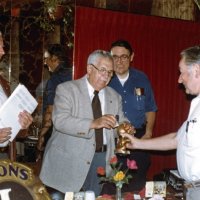 7/14/82 - New Member Induction, L & L Castle Lanes, San Francisco - Howard Pearson - L to R: Newly inducted Lion Howard Pearson, PDG Joe Giuffre, paying fine, Handford Clews, and Tail Twister Frank Ferrera.