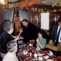 1/19/83 - New Member Induction & Ladies’ Night, L & L Castle Lanes, San Francisco - Far left, near banner: Drake Woznick; near side, head table: Dorothy Pearson and Les Doran; head table, L to R: Carol Stanaway, Handford & Margot Clews, and John Madden.