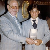 4/13/83 - Scholarship Program Presentation, L & L Castle Lanes, San Francisco - Bob Dobbins, left, with a scholarship competition participant.