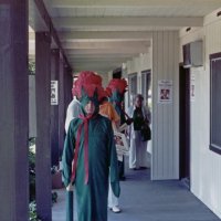 5/11/85 - District 4-C4 Convention, El Rancho Tropicana, Santa Rosa - Costume Parade - Charlie Bottarini posing in costume, with Grace San Filippo and other members in the background on the right.