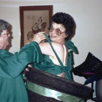 5/6/89 - District 4-C4 Convention, El Rancho Tropicana, Santa Rosa - Costume Parade - Pat Ferrera, left, help Estelle Bottarini get her costume on.