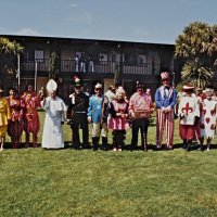 5/20/95 - El Rancho Tropicana, Santa Rosa - Costume Parade - L to R: Diane Johnson (1994), Handford (1983) & Margot (1984) Clews, Irene Tonelli (1982), Lorraine & Mike Castagnetto (1980), Bill Tonelli (1980), Giulio Francesconi (1975), Charlie Bottarini (1969), Linnie & Ron Faina (1968), Lyle Workman (1967), Estelle Bottarini (1966), Pauline (1964) & Bob Dobbins (1960), and Donna Francesconi (1960). Year following name is when each costume appeared in the District Convention.