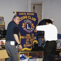 12-20-02 - Mission Education Center Christmas with Santa, Mission Education Center, San Francisco - Aaron Straus, on left, Sheriar Irani, and Al Gentile getting things ready before Santa arrives.