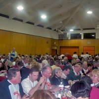 2/23/2002 - Recreation Center for the Handicapped, San Francisco - 20th Annual Crab Feed - Part of hte crowd enjoying dinner. Al Gentile (white hair) is 6th from right, near table, far side.