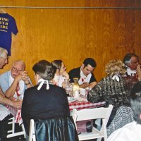 2/26/05 - Recreation Center For the Handicapped, San Francisco - 23rd Annual Crab Feed - 429 attending - Charlie Bottarini, standing, talking with guests.