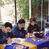 3/4/05 - Lowell Leo Club - Members of the Leos display Leo and Lions information at a fair at their school.