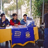 3/4/05 - Lowell Leo Club - Members of the Leos display Leo and Lions information at a fair at their school.