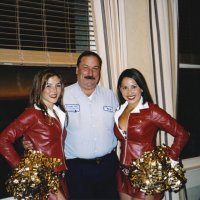 10/20/04 - Cliff House Restaurant, Terrace Room - George Salet proudly posing with 49er cheerleaders Wendy and Kristen.
