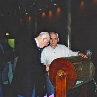 11/27/05 - 27th Annual Giulio Francesconi Charity Raffle Drawing at the Italian American Social Club - Ted Wildenradt just getting ready to place his numbered ball in the drum with Charlie Bottarini.