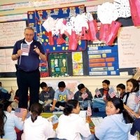 2/17/06 - Flag Day Program at Mission Educational Center for 211 students - Lion Aaron Straus making points about our nation‘s flag during his presentation to students.