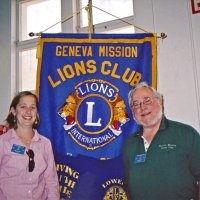 11/22/05 - Mission Educational Center, San Francisco - Lions Bre Martinez and Bob Lawhon proudly pose next to our Club banner.