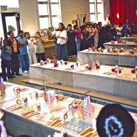 11/22/05 - Mission Educational Center, San Francisco - Students singing a song with their teacher prior to lunch being served.