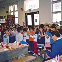 11/22/05 - Mission Educational Center, San Francisco - Students singing one of their songs with their teacher playing the guitar. Lots of motion in many of the songs.