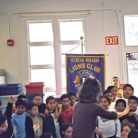 11/22/05 - Mission Educational Center, San Francisco - Students crowing around for a photo op.