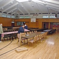 2/23/08 - 26th Annual Crab Feed - Janet Pomeroy Recreation & Rehabilitation Center, San Francisco - Getting started on table setup are, L to R, Bill Graziano, George Salet, chairman, and Bob Fenech in the background.