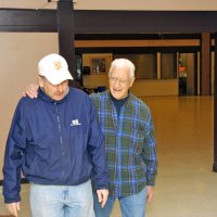 2/23/08 - 26th Annual Crab Feed - Janet Pomeroy Recreation & Rehabilitation Center, San Francisco - With much of the table settings done, Bob Fenech, left, is joined by Al Gentile going to check progress.