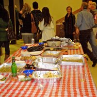 2/23/08 - 26th Annual Crab Feed - Janet Pomeroy Recreation & Rehabilitation Center, San Francisco - Guest going in to dinner as the hors d’oeuvres table lies devastated.