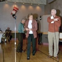 11/29/09 - 31st Annual Guilio Francesconi Charity Raffle drawing, Italian American Social Club, San Francisco - L to R: Charlie Bottarini, and Diane & Dick Johnson.