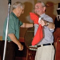 11/29/09 - 31st Annual Guilio Francesconi Charity Raffle drawing, Italian American Social Club, San Francisco - “Dutch” Blanchard adds his drawing ball while Charlie Bottarini looks on.