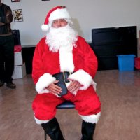 12/18/09 - Christmas with Santa, Mission Education Center, San Francisco - Officer Ignacio “Natcho” Martinez as Santa - Santa waiting for the children to arrive and perform for him.