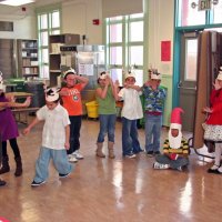 12/18/09 - Christmas with Santa, Mission Education Center, San Francisco - Officer Ignacio “Natcho” Martinez as Santa - A class of reindeer performs a skit for Santa.