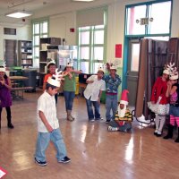 12/18/09 - Christmas with Santa, Mission Education Center, San Francisco - Officer Ignacio “Natcho” Martinez as Santa - A class of reindeer performs a skit for Santa.