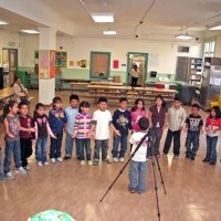 12/18/09 - Christmas with Santa, Mission Education Center, San Francisco - Officer Ignacio “Natcho” Martinez as Santa - A class performing a song for Santa.