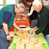 11/20/09 - Thanksgiving Luncheon, Mission Education Center, San Francisco - Lions preparing food for the luncheon. L to R, foreground: Aaron Straus with Al gentile; background Dick & Diane Johnson.