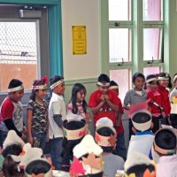 11/20/09 - Thanksgiving Luncheon, Mission Education Center, San Francisco - A class singing a song.