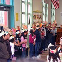 11/20/09 - Thanksgiving Luncheon, Mission Education Center, San Francisco - A class singing a song.