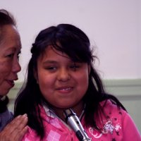 11/20/09 - Thanksgiving Luncheon, Mission Education Center, San Francisco - A student sharing her story from a letter she has written.