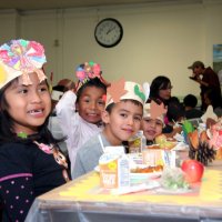 11/20/09 - Thanksgiving Luncheon, Mission Education Center, San Francisco - Someone loves their picture being taken.