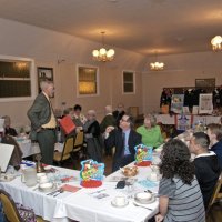 11/17/10 - Speakers: Balboa High School Alumni Association - Italian American Social Club, San Francisco - Dick Johnson (standing) talking about selling tickets. Head table: Bre Jones; far table, far side, l to r: LaVerne Cheso, Margot Clews, Emily Farrah, Enrico Micheli, and Emily Powell; near side: Dick & Diane Johnson, Arline Thomas, Al Gentile, and Nick Kafkas (Balboa guest); near table, far side: Kevin Kerr, Principal, Susan Emmerich Ritter, Vice Principal; near side: four Balboa guests, Robert Quinn, and George Salet.