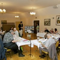 3/16/11 - Speakers: Athens Avalon Green Space - Italian American Social Club, San Francisco - Steve Ah Nin (seated to left of board), Darin Greyerbiehl, and Sandra Tanamugsukbovon making their presentation. Left table, near side, front to back: Handford Clews, obscured, David Demartini, Bob Fenech, Robert Quinn, Bill Graziano, and Viela du Pont (obscured, later to become a member); right side: Al Gentile; head, l to r: Charlie Bottarini, and Bre Jones; far table: front to back: George Salet, May Wong (later to become a member), and Emily & Joe Farrah.